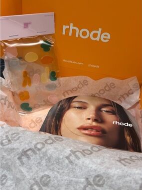 RHODE packaging with stickers